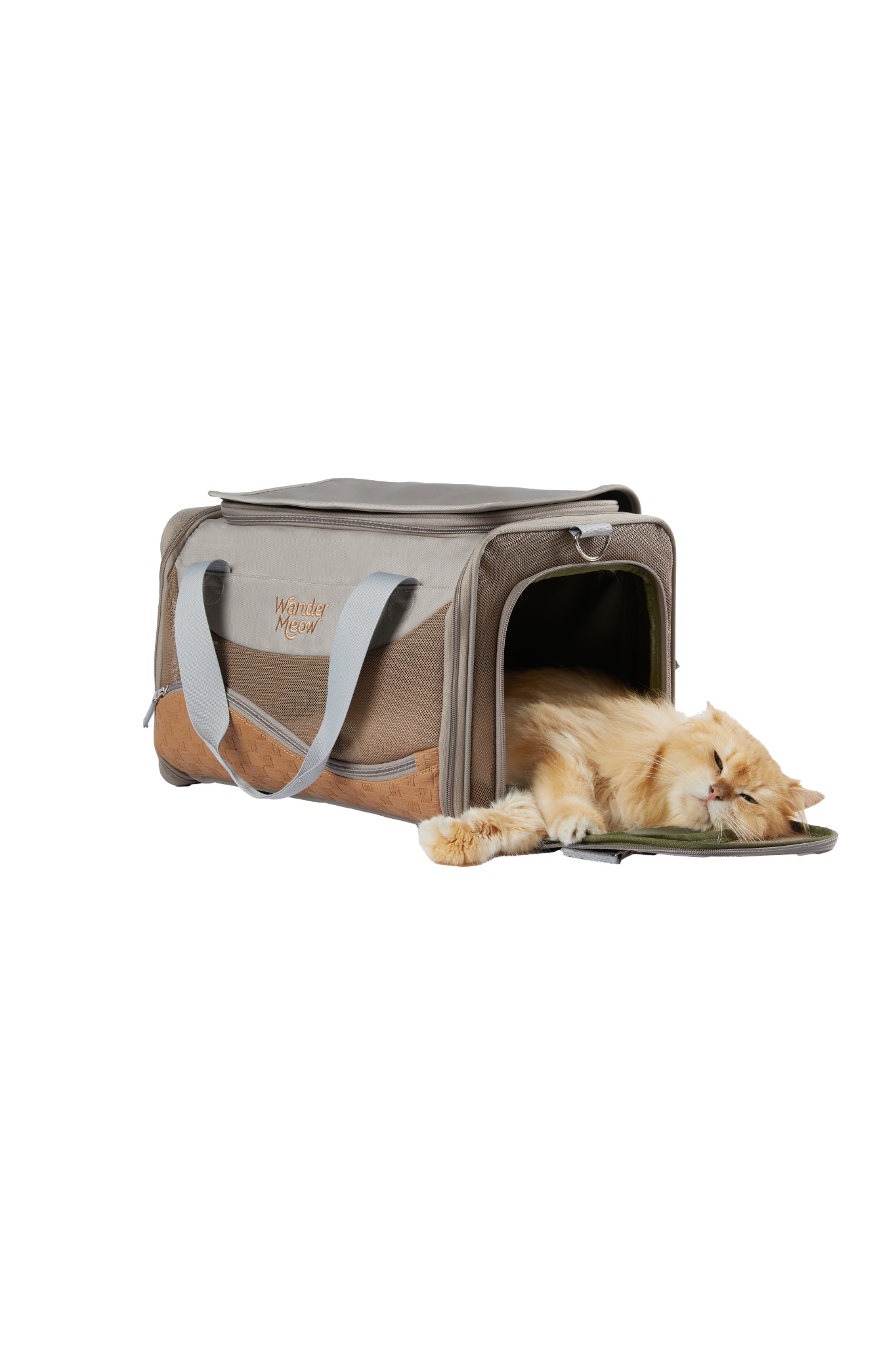Orange cat resting through the open side doorway of the gray Wander Meow carrier against a white studio background.